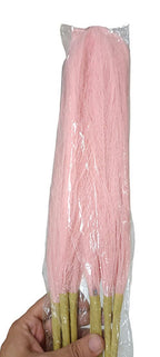 Pink artificial pompas filler sticks bundle held in hand, straight stem floral filler for vase arrangements