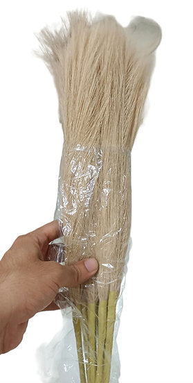 Pink artificial pompas filler sticks bundle held in hand, straight stem floral filler for vase arrangements