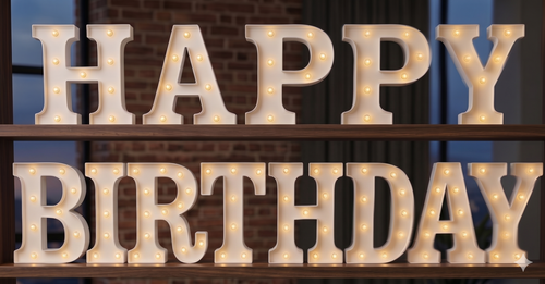 Lumina Lights Full A-Z Alphabet Marquee LED Letter Set with warm white glowing bulbs displayed on wooden shelves — 26 letters complete set for wedding and party decoration