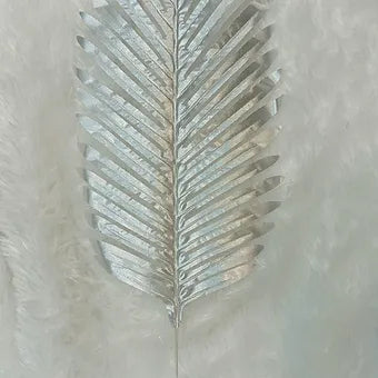 Artificial golden palm leaves