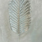 Artificial golden palm leaves