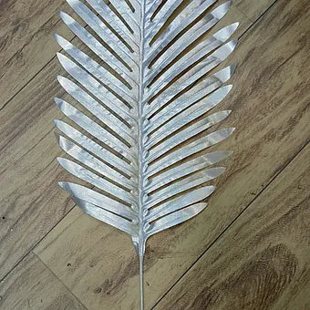 Artificial golden palm leaves