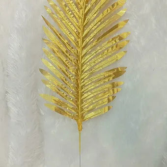 Artificial golden palm leaves