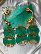 Handmade white and gold resin serving tray with gold leaf flakes and gold branch-style handles, geode art design